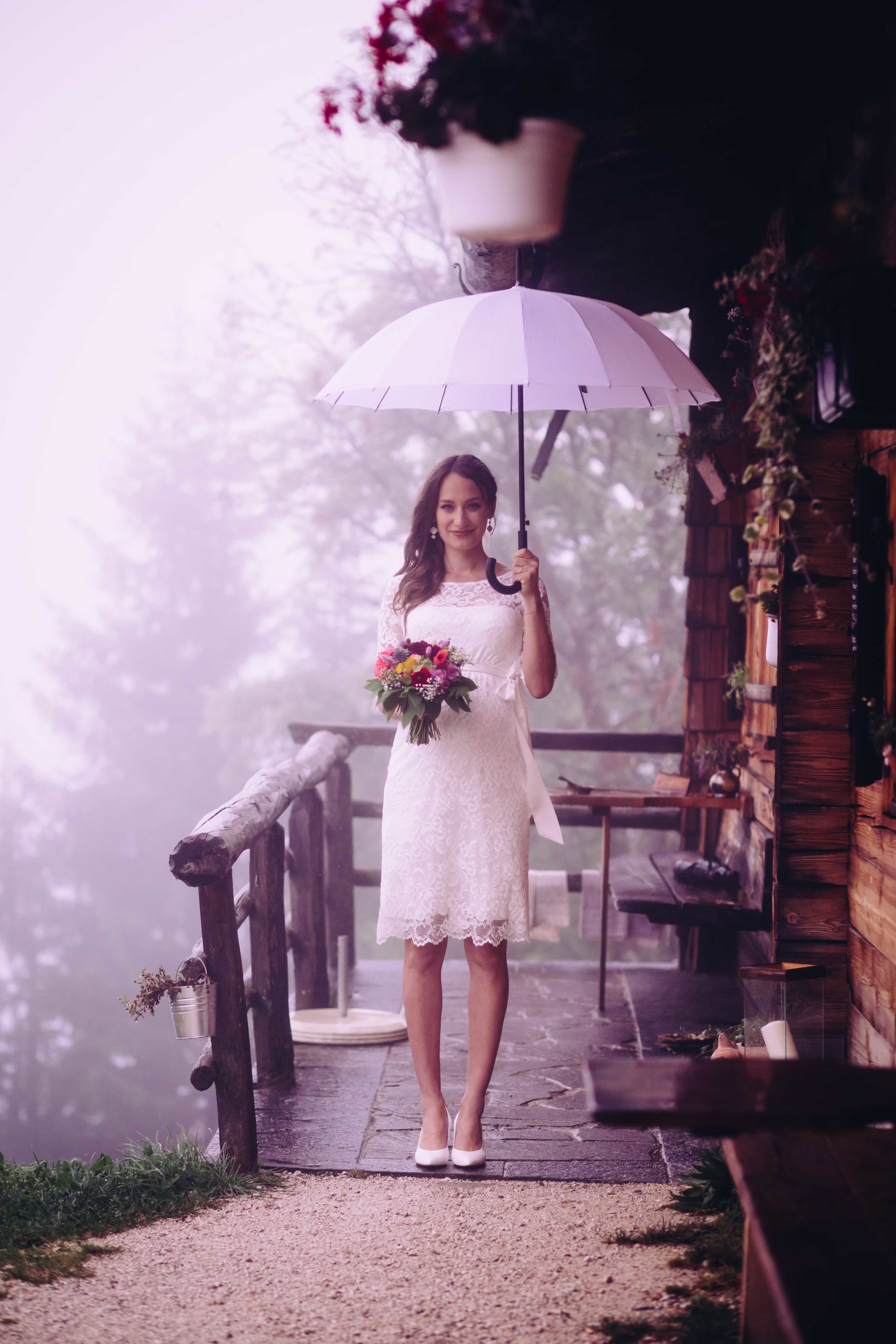 Braut mit Schirm Hochzeit